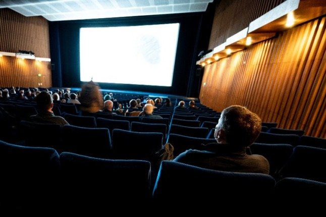 Les cinéphiles au Kino International à Berlin.