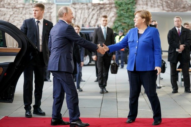 Le président russe Vladimir Poutine et l'ancienne chancelière allemande Angela Merkel à Berlin en janvier 2020.