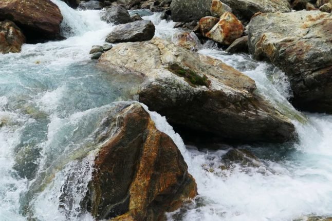 Shhh, it's Sunday! An image of a Swiss river that may or may not be flowing too loudly. Photo by Arie Wubben on Unsplash